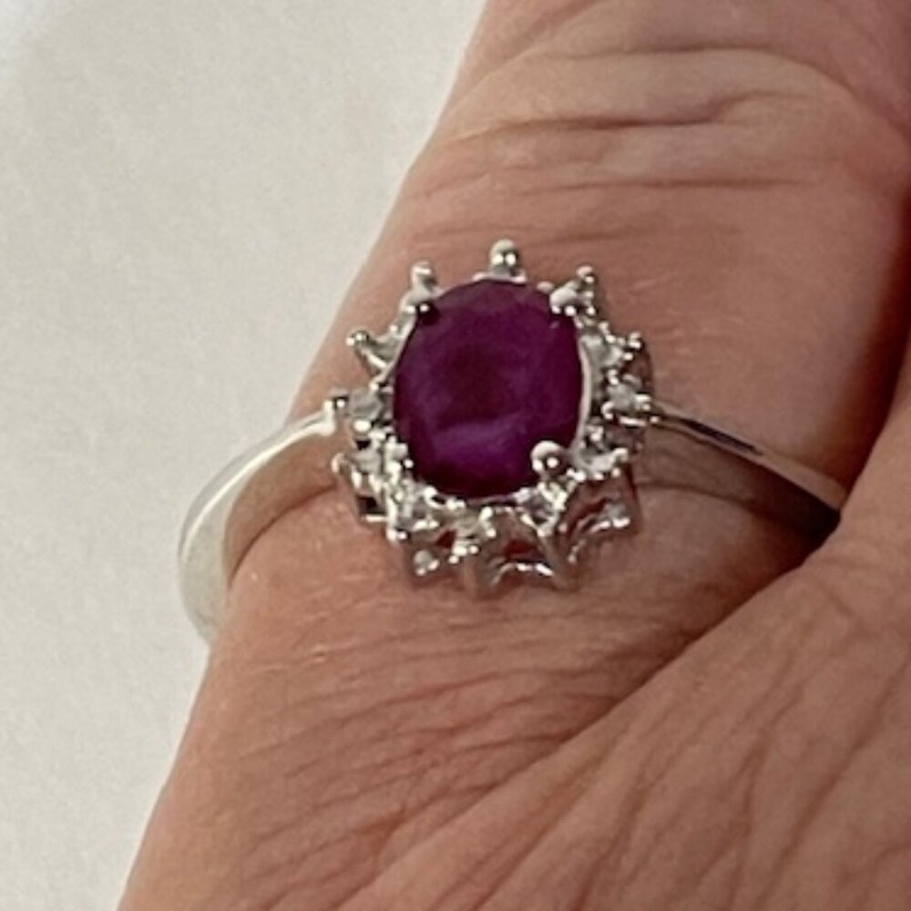 Sterling silver and red gemstone ring. Appx. size 6 1/4.